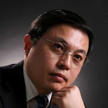 Portrait photograph of Prof. Hu